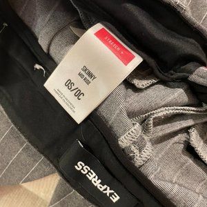 Express stretch skinny mid-rise pant. Gray with white pinstripes. Size 0S.